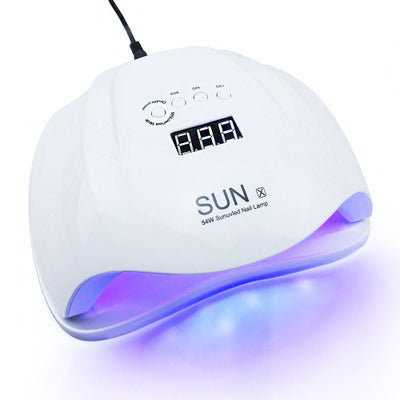 "Professional LED/UV nail lamp dryer with timer settings, designed for fast gel nail curing and salon-quality results at home."